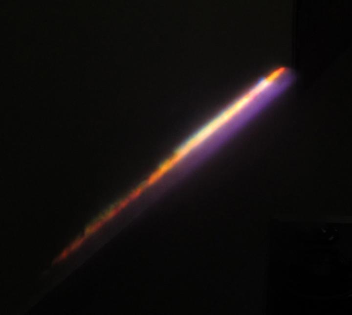 Light Pulse Fired from a 10 TW Laser, Dispersing into Water Vapor