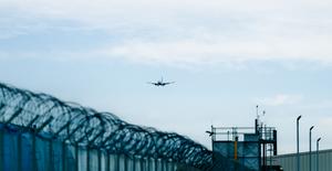 An aircraft approaching a runway.