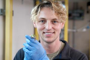 Dr Anthony Waddle with frog