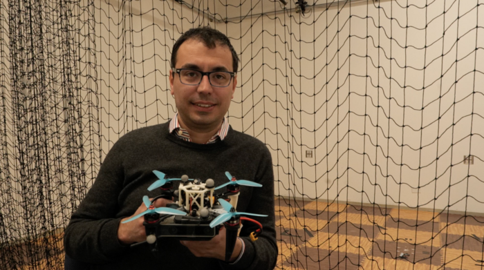 Giuseppe Loianno, professor of electrical and computer engineering, with drone