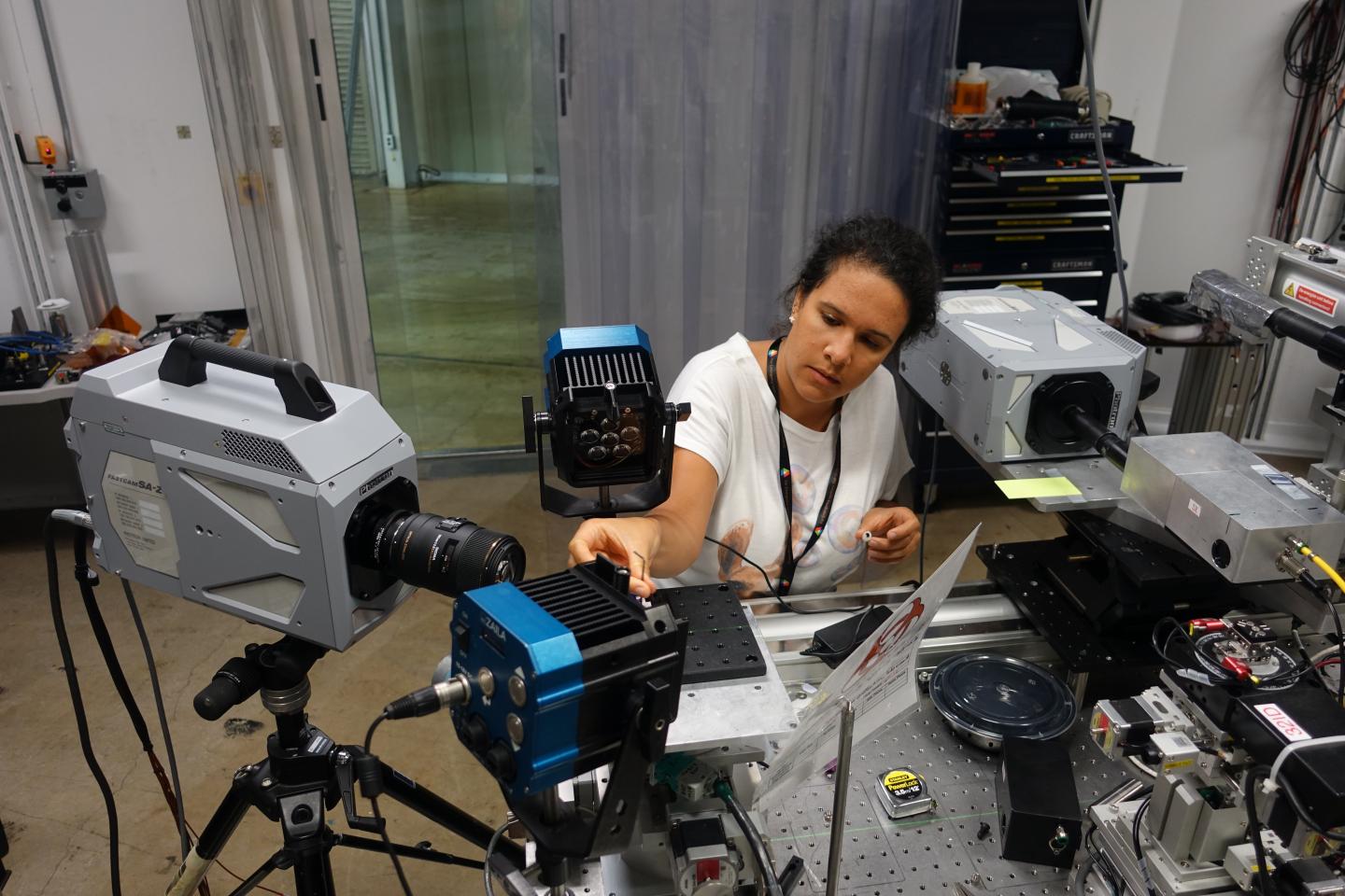 Ophelia Bolmin setting up a specimen for high-speed x-ray imaging at Argonne National Lab