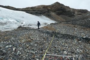 Simon Browning surveying rocky terrain by Glacier Col.