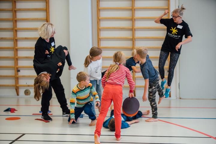 Children and Adults Enjoying Physical Activity Together