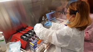 Maddalena Parafati at Kennedy Space Center preparing the programmable syringe pumps that dispense the culture media at fixed reproducible flow rates into the tissue chips.