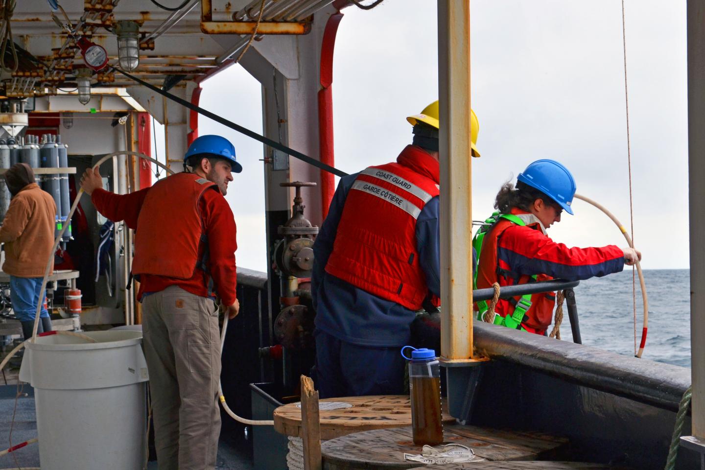 Researchers Collecting Water Samples
