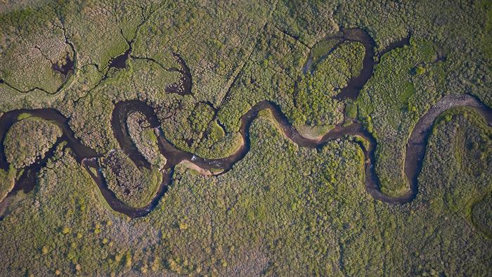 Aerial view of meandering river