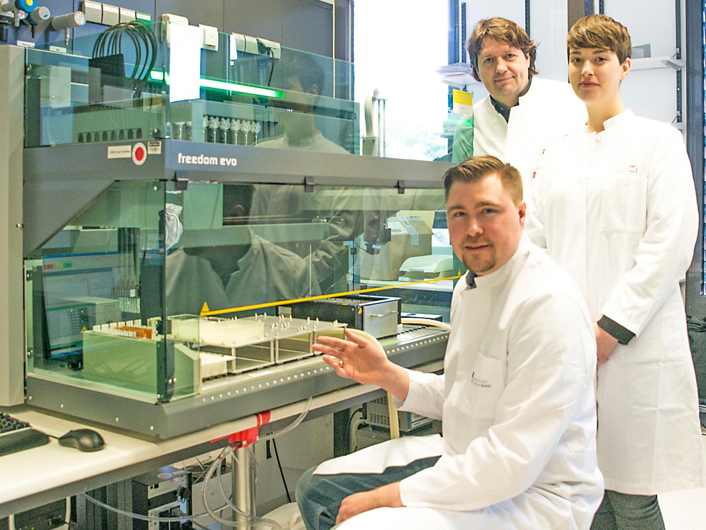 The Research Team at the Pipetting Robot