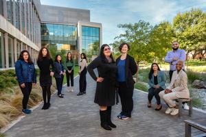 Piya Ghose (in foreground) with members of her lab.