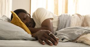 Person sleeping with an Oura ring