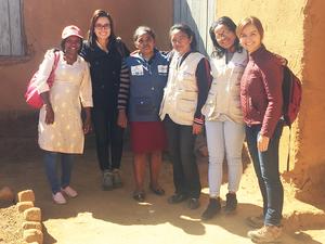 Researchers with community health workers