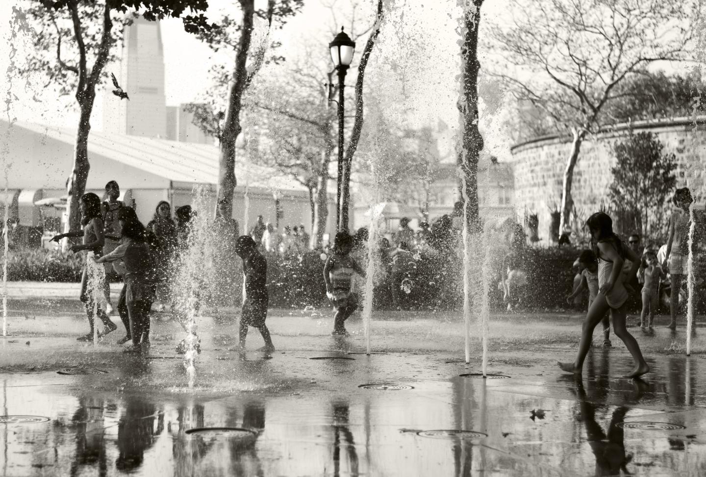 Children Play in a Jet Stream Fountain
