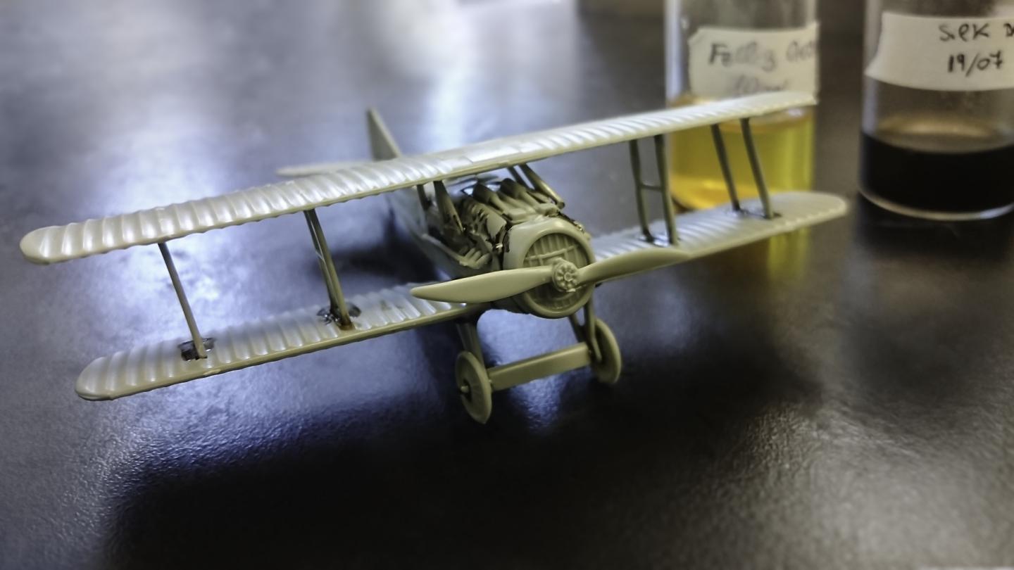Model airplane assembled with silk-based glue
