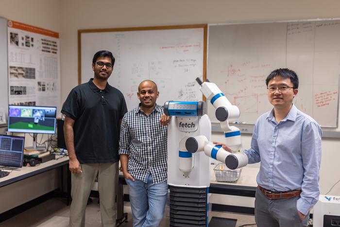 UTD Researchers with Robot
