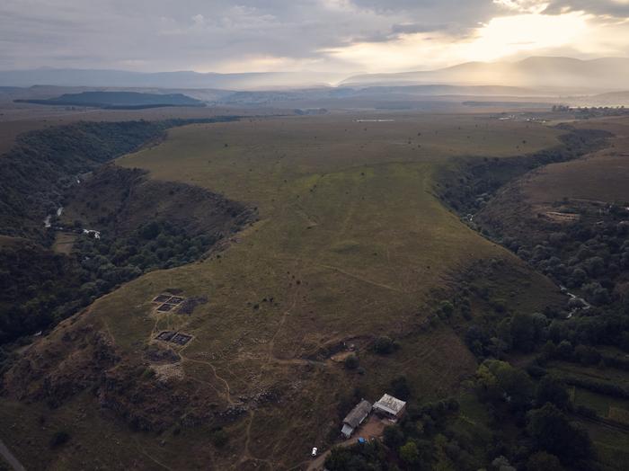 Atmospheric photo of the site at dusk