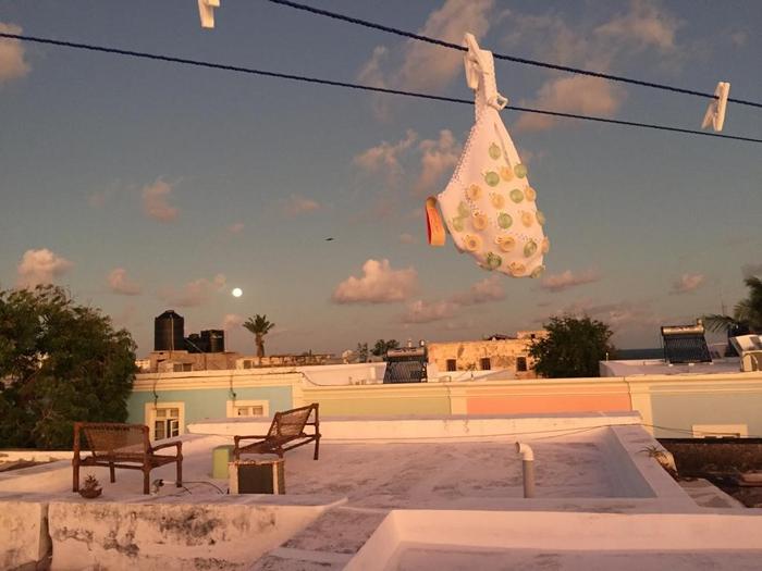 EEG cap drying in the Mozambican sun