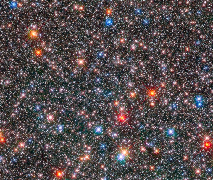 This Hubble Space Telescope image shows stars at various stages of their lives