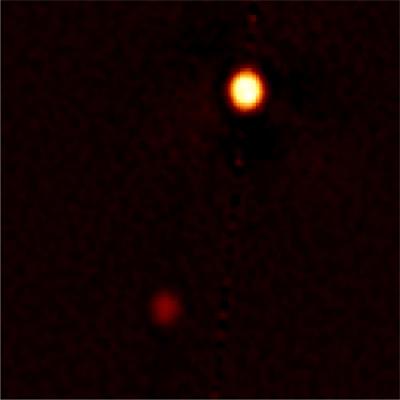 Speckle Image Reconstruction of Pluto and Charon