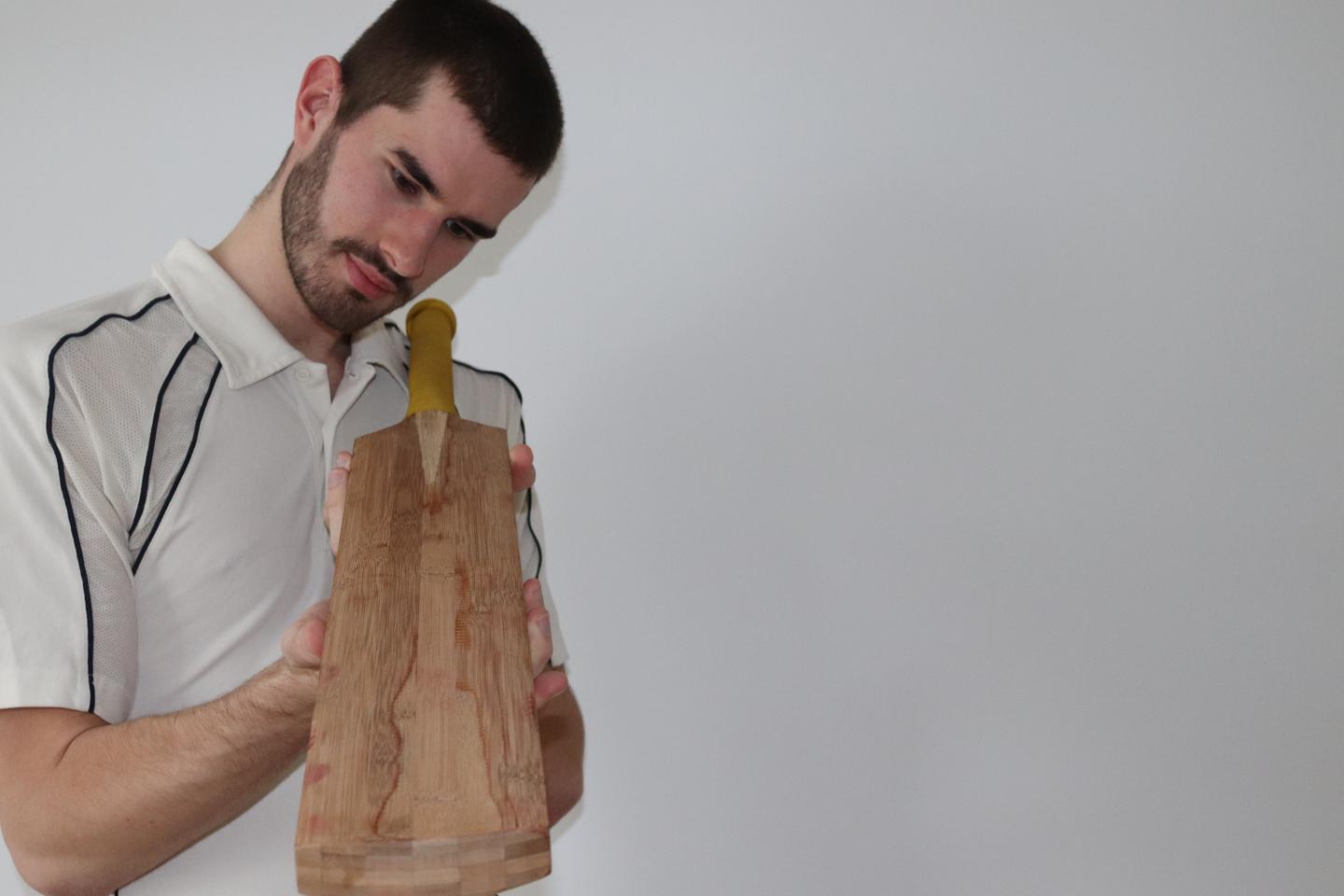Co-author Ben Tinkler-Davies examines bamboo cricket bat
