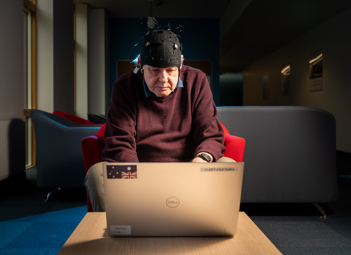 A volunteer takes part in research for Fastball EEG.