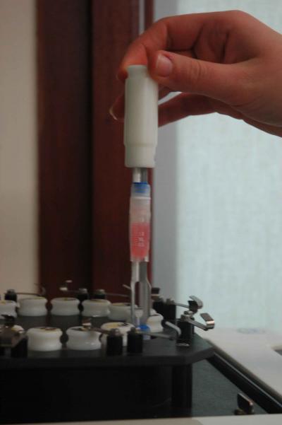 Ovarian Tissue Being Inserted into a Tube for Freezing and Storage