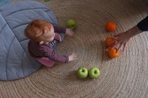 Baby learning words and numbers through play