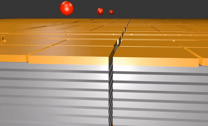 Graphic showing two quantum computer modules being aligned so that atoms can transfer from one quantum computer microchip to another