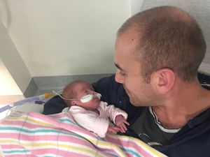 Fathers administer kangaroo care