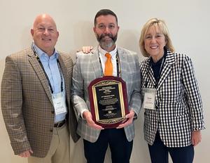 National Excellence in Extension Team Award trophy