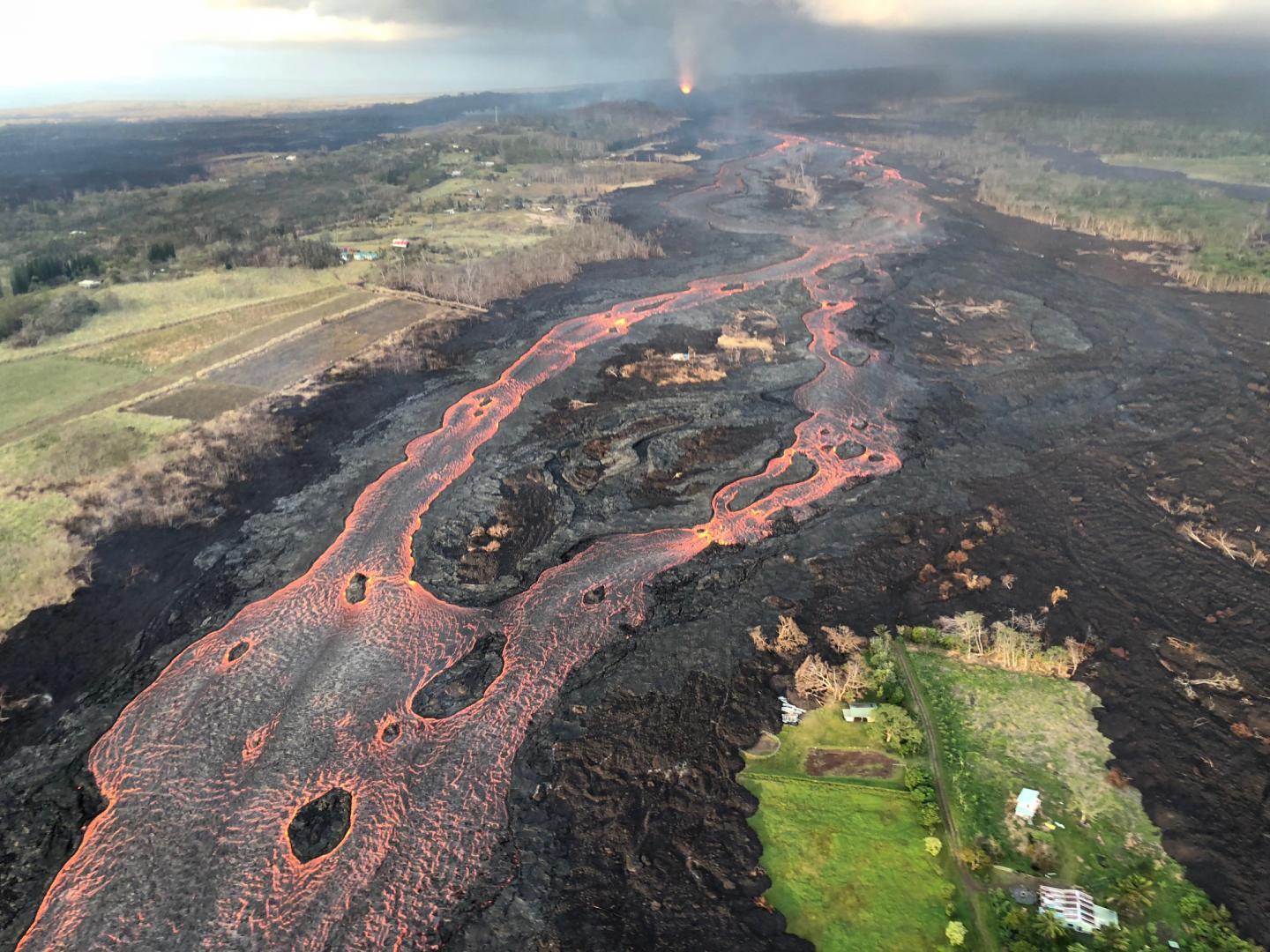Houses surrounded by lava