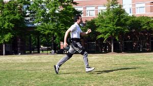 AI-Powered Training Improves Human Performance in Robotic Exoskeletons