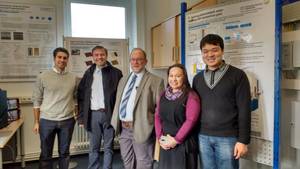 CAO Hujun and Prof. CHEN Ping discussed work in the laboratory