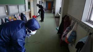 Team members during sampling of dusts in the school building