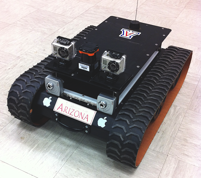 An experimental rover that serves as a testbed for hardware and software