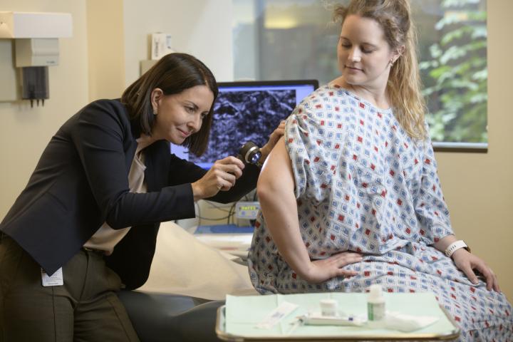 Dr. Clara Curiel-Lewandrowski and Patient