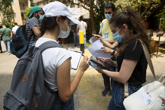 IOM enumerators gather data