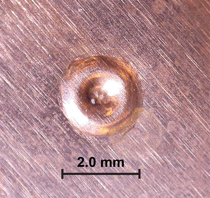 Itokawa grain with scale