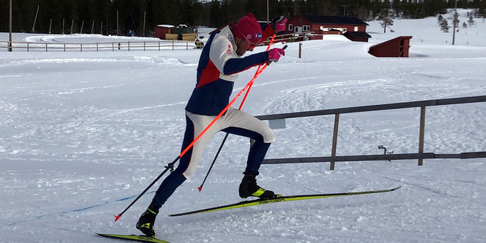 Cross-country skier going uphill