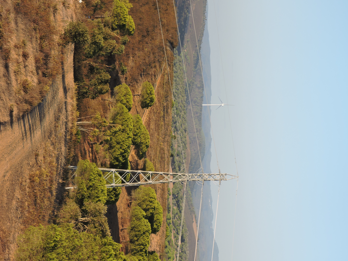 Power lines and wind turbine in Portugal