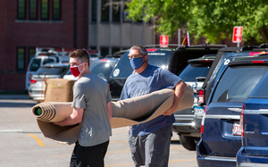 A student moves into Friley Hall at Iowa State University, August 3, 2020.