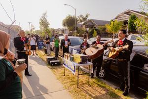 Mariachis playing at a tree planting event in the Boyle Heights neighborhood in Los Angeles, California