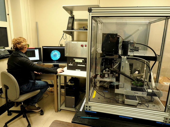 Researcher Hannah Schneider imaging corn roots