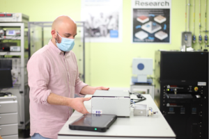 Alfredo Ongaro in the lab with the device