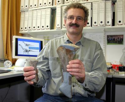 Martin Sander with Thigh Bones of Europasaurus