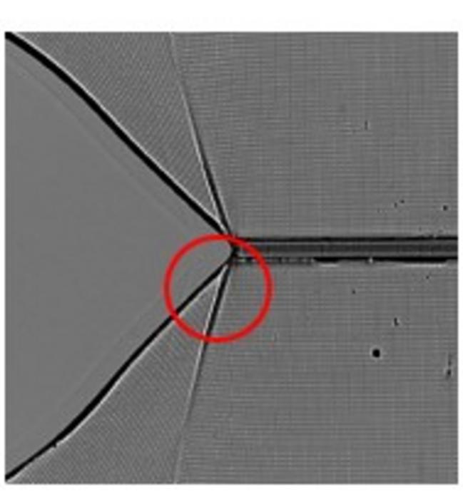 Snapshot of the material deformations formed by a single rapidly propagating crack moving left to right