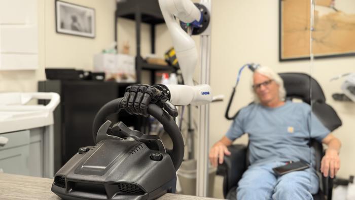 Bionic hand on steering wheel