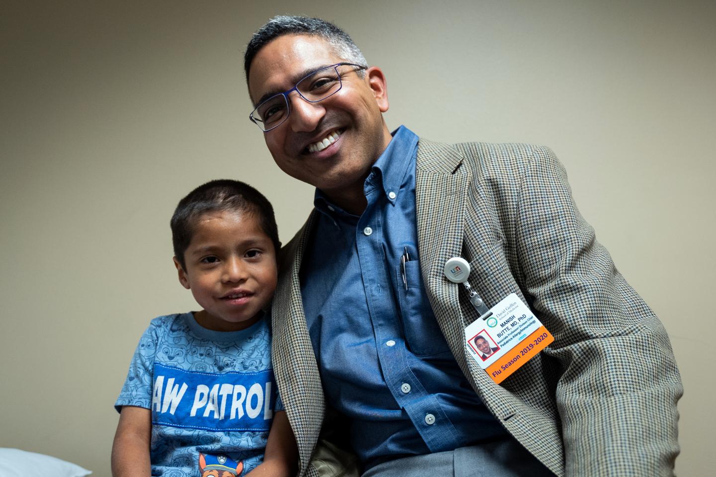 Dr. Manish Butte with patient Abraham Gonzalez-Martinez
