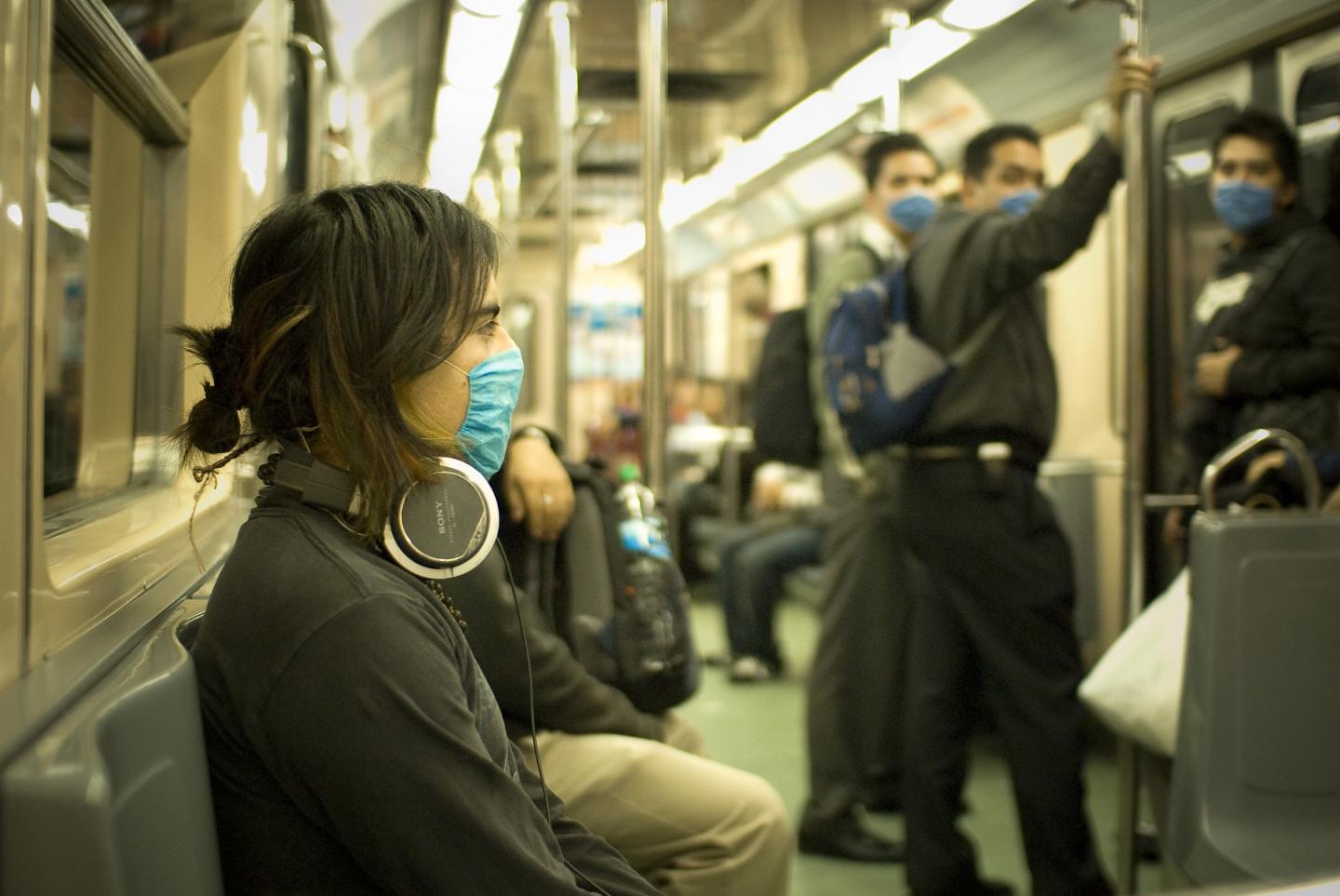 Train Passengers with Flu Masks