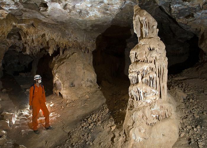 A dry, dusty cave with stalagmite