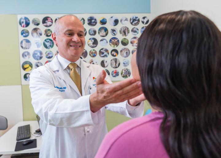 Dr. Thomas Inge Examines a Patient