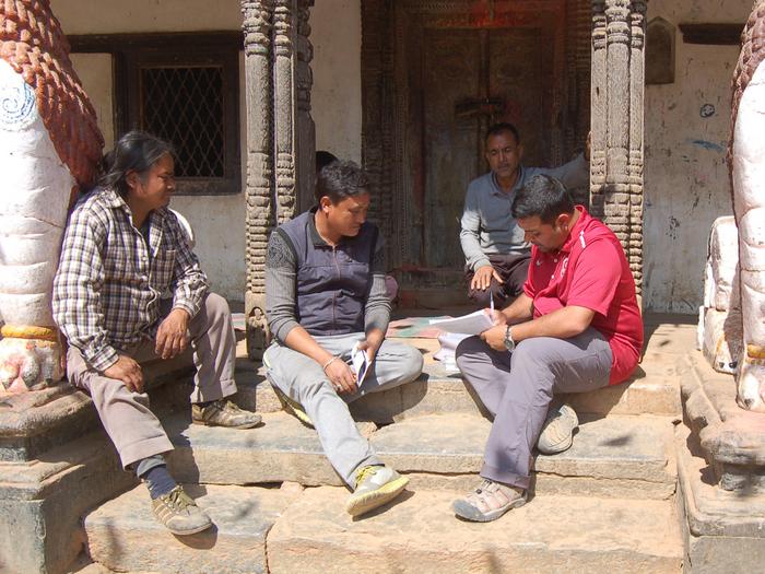 Researcher interviews Nepali individuals